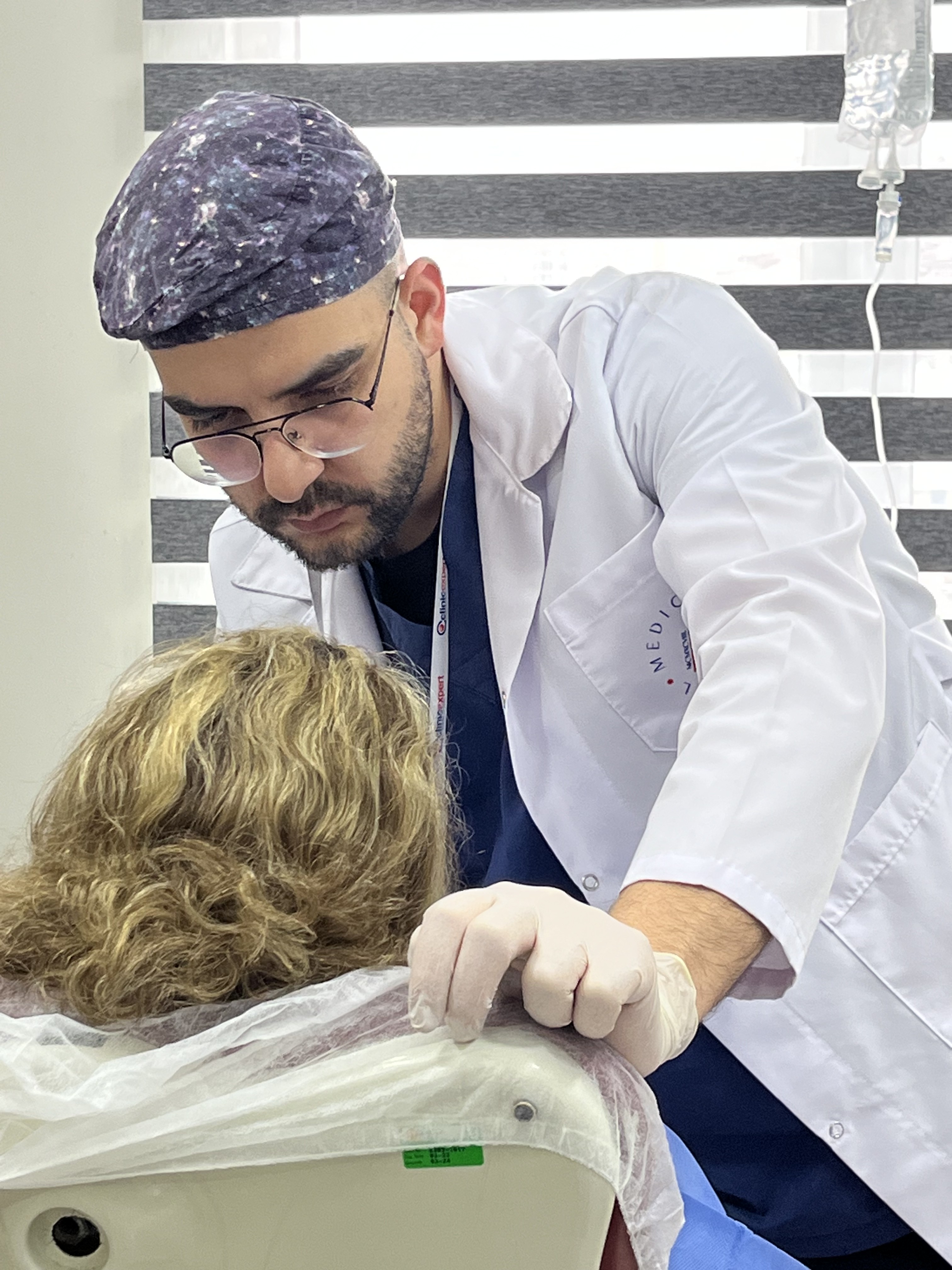 Woman receiving a gentle facial rejuvenation treatment